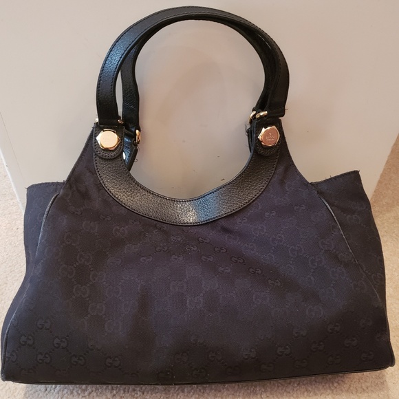 Gucci Handbags - Authentic Black Canvas Gucci Handbag (Pre-Owned)